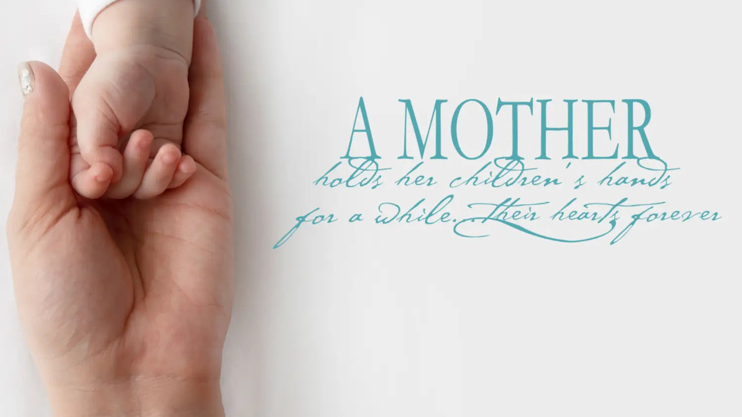 Picture of a mother holding her newborn child's hand next to a pretty wall quote decal by The Simple Stencil that reads: A mother holds her children's hands for a while, their hearts forever.