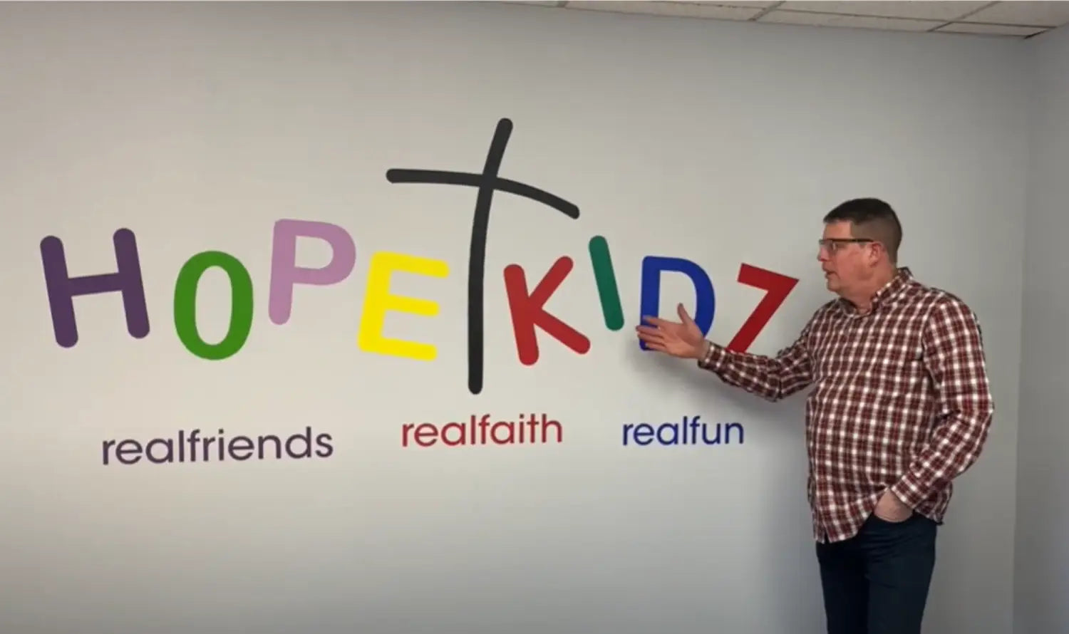 Picture of Church Nursery Wall Decor created using wall decals by The Simple Stencil - Colorful, easy to install custom wall art is the perfect DIY Signage solution for churches, schools and businesses!