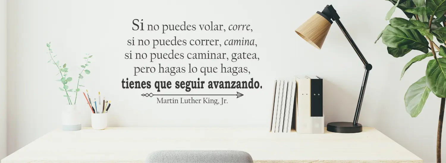 A collection of vinyl wall decals for school or office environments with spanish speaking students or employees. Motivate using bi-lingual vinyl wall decals by The Simple Stencil