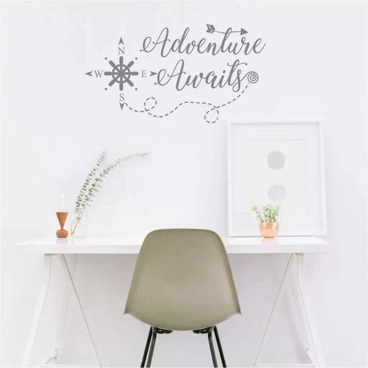 Adventure Awaits Wall Decal Sticker - Easy to install wall decal that reads: Adventure Awaits in a whimsical font with arrows and compass. Looks great over a study area or desk. By TheSimpleStencil.com