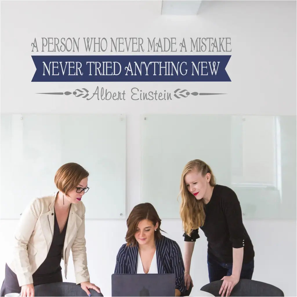 An inspirational wall decal of a quote by Albert Einstein that reads: A person who never made a mistake never tried anything new. This motivational quote will inspire at work or in the classroom to encourage getting out of comfort zone to acheive great things!