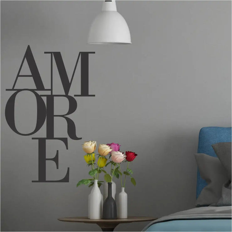 AMORE - vinyl wall decal letters add a romantic touch to this master bedroom wall using a decal by The Simple Stencil in black.