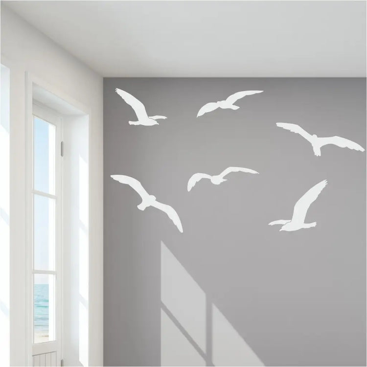Set of nine soaring seagull decals in your choice of color and size to decorate the walls and windows of your home, beach themed room, etc. Easy to apply, look painted on yet removable when ready for a change!