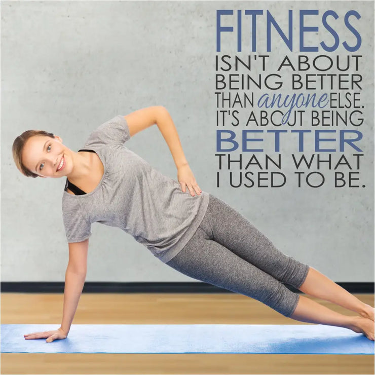 Fitness quote wall decal displayed on a yoga studio gym wall that reads: Fitness isn&