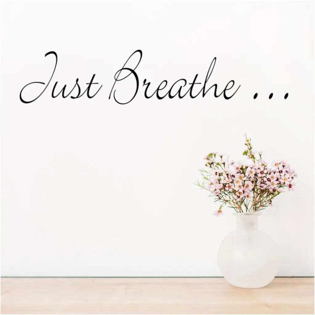 Just Breathe... beautifully scripted vinyl wall decal by The Simple Stencil promotes relaxation and calm wherever it's placed. Perfect for meditation rooms, spas or anywhere you go to relax and unwind.