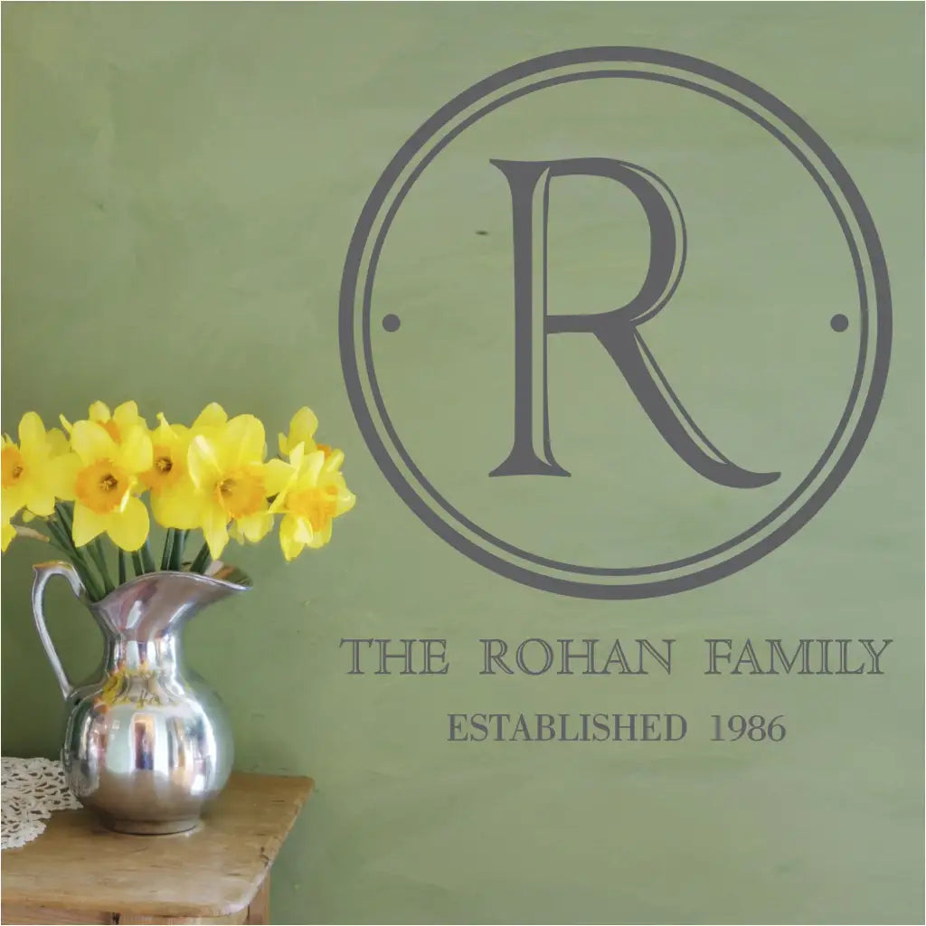 Beautiful classic plaque style wall monogram that includes your family initial and name including an established date. Easy to apply, looks painted on and removable! Order in over 80 colors and many size options at The Simple Stenc