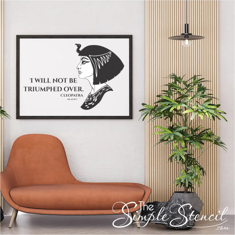 Framed Cleopatra poster print in a home office: A framed Cleopatra poster print hanging in a home office, inspiring determination and leadership.