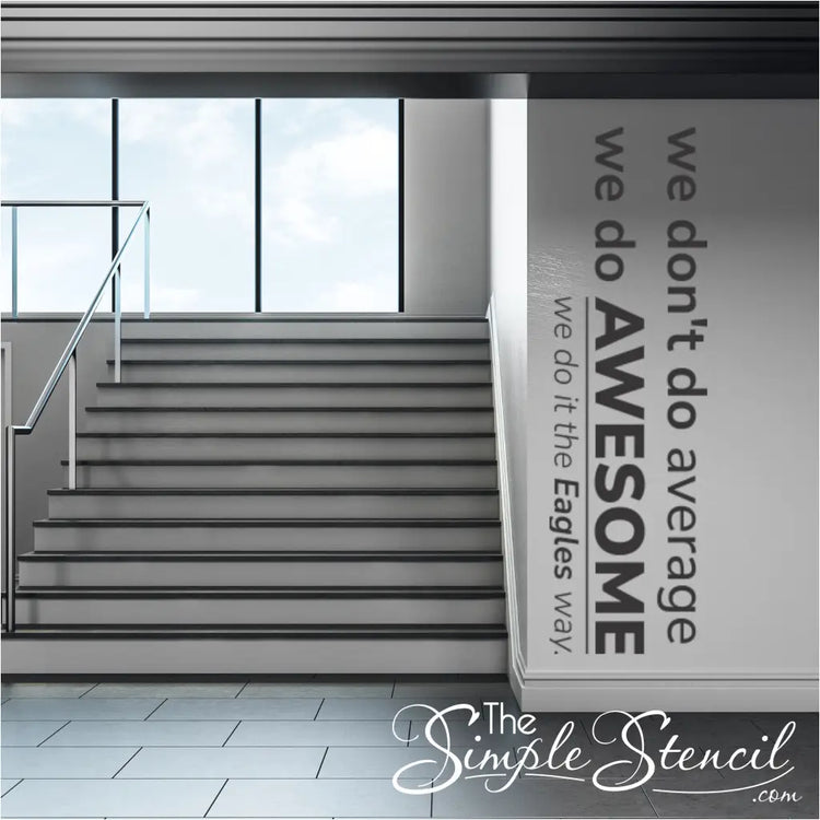 A view of a school hallway featuring a vertically placed "We Don't Do Average, We Do AWESOME The EAGLES WAY" custom wall decal, enhancing the overall school decor and welcoming students.