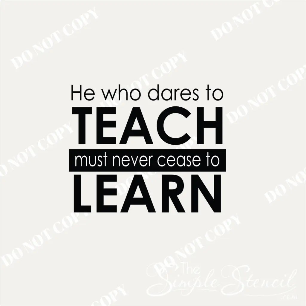 Close-up of a white vinyl wall decal with the quote "He who dares to teach must never cease to learn"  - A great decor idea for a teacher's lounge or office display.