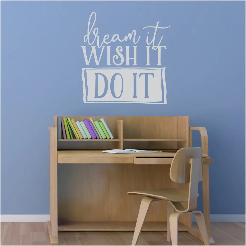Children's study area or office wall with large decal display that reads: Dream it Wish it Do it, in a super creative way.