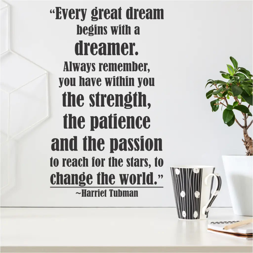 Inspirational wall quote decal by The Simple Stencil displayed on a wall over a desk to inspire and teach during Black History Month. The quote is by Harriet Tubman and reads: Every great dream begins with a dreamer. Always remember you have within you the strength, the patience and the passion to reach for the stars, to change the world. ~Harriet Tubman