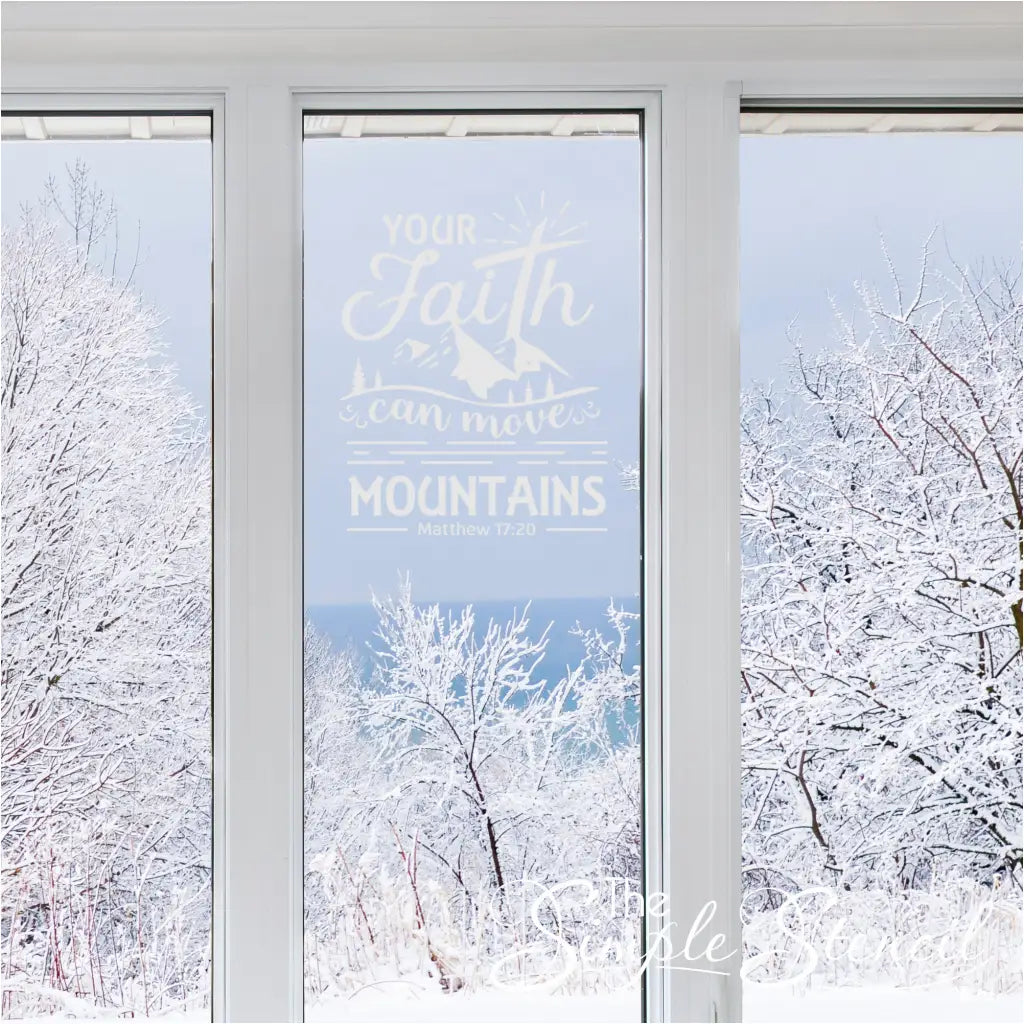 Your Faith Can Move Mountains - Matthew 17:20 vinyl wall decal that looks lovely on a window with a distant mountain view. By The Simple Stencil