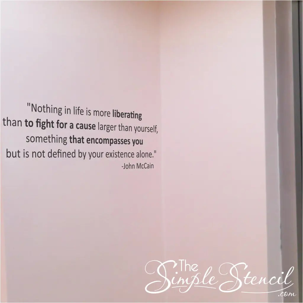 A simple wall quote decal of John McCain's words about fighting for a cause larger than ourself is a great way to decorate a high school classroom or non-profit office wall