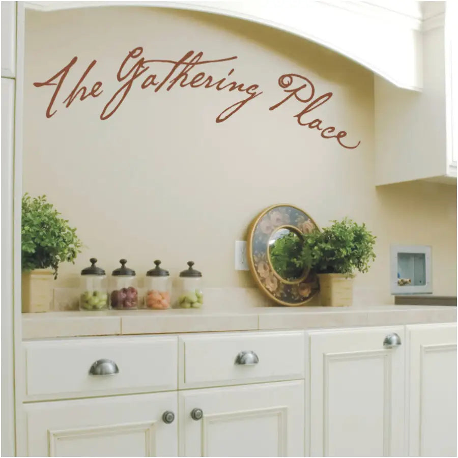 The Gathering Place - vinyl wall decal in a hand lettered script font is a great way to decorate the area in your home where friends and family gather to celebrate life and each other. 