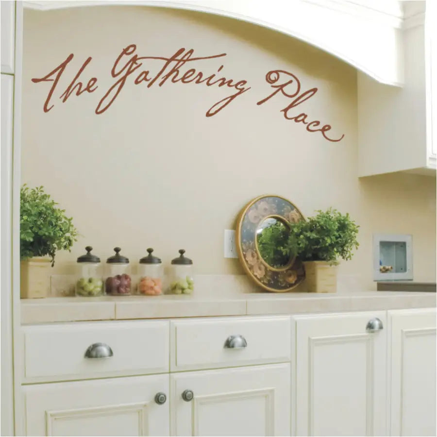 The Gathering Place - vinyl wall decal in a hand lettered script font is a great way to decorate the area in your home where friends and family gather to celebrate life and each other.