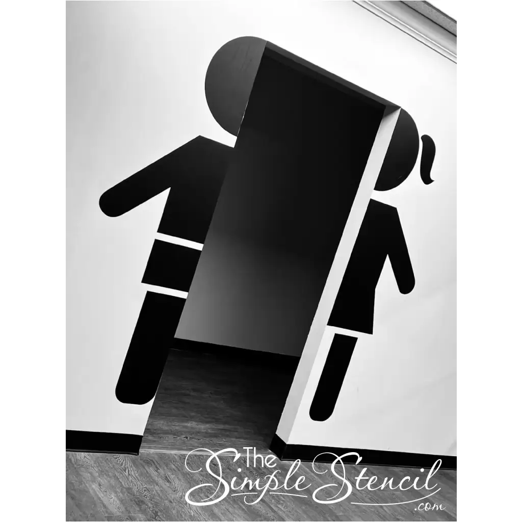 Customer Supplied picture of Boy and Girl Restroom Sign Decals installed on walls leading to restrooms - Design and decals supplied by The Simple Stencil