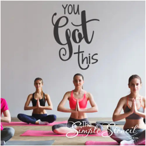 You Got This large vinyl wall decal displayed on a yoga studio wall provides an inspiring focal point for those difficult poses!
