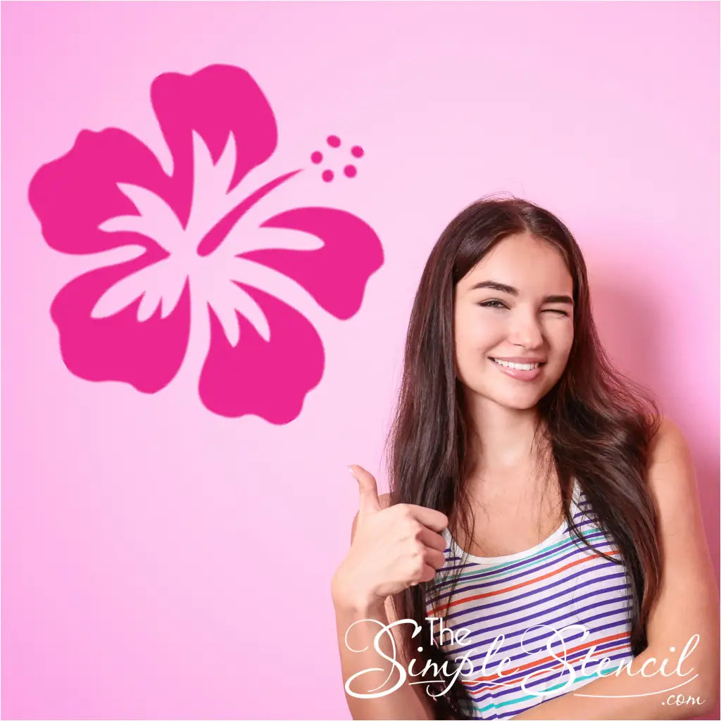 Detailed hibiscus flower vinyl wall decal in a vibrant color on a smooth wall surface.