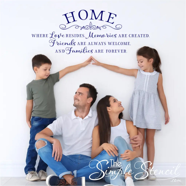 Large Blue Wall Decal installed above a Family of Four Sitting on the Floor - Made in USA Quality