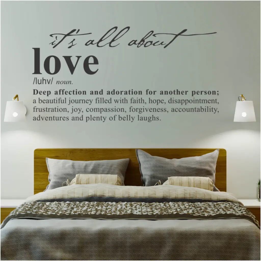 Love definition wall decal installed over a bed in a master bedroom and aids to remind you and your partner of the love you share. 