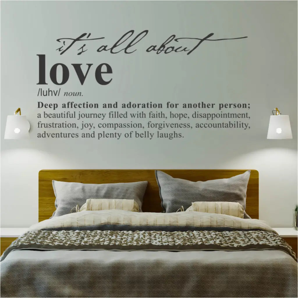 Love definition wall decal installed over a bed in a master bedroom and aids to remind you and your partner of the love you share.