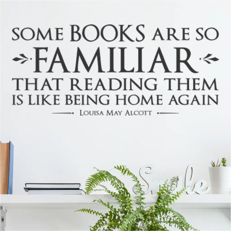 Louisa May Alcott quote wall decal displayed above a cozy reading chair and bookshelf.