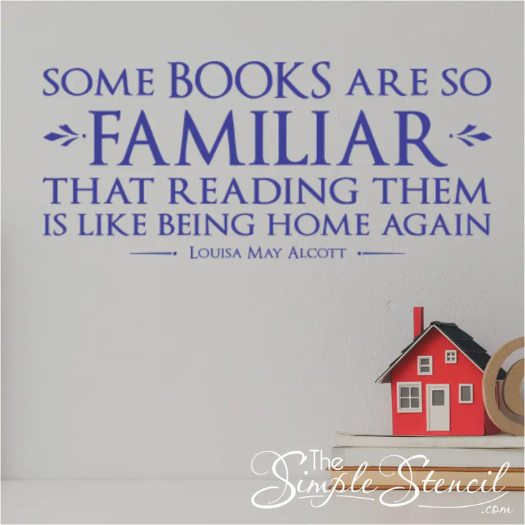 Wall decal with Louisa May Alcott quote in a public library near the women's literature section.