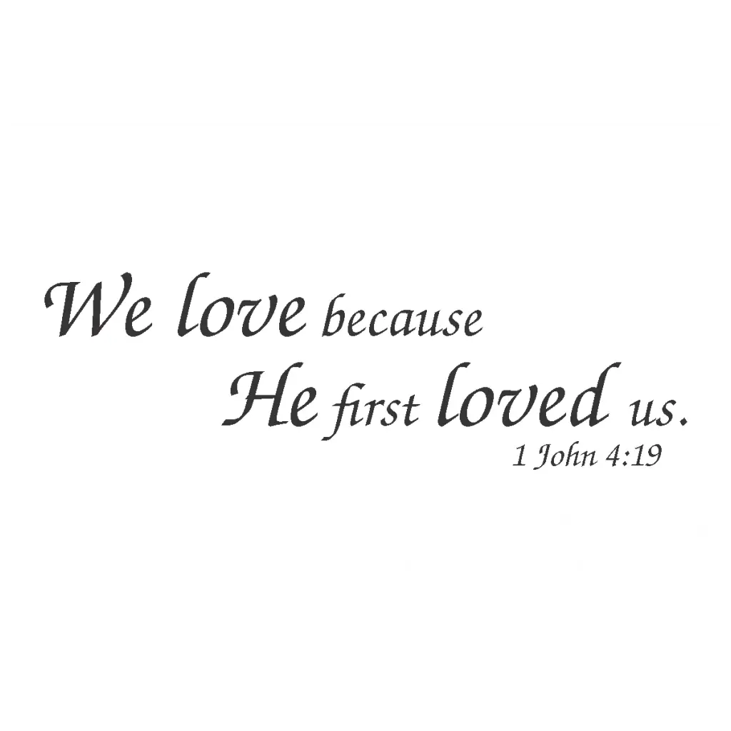 "We Love Because He First Loved Us" Bible Verse Wall Decal in Classic Script Font. Available in various sizes and colors.