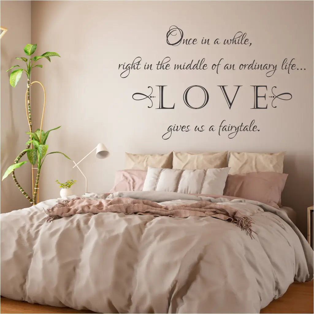 A romantic wall decal by The Simple Stencil looks beautiful in your master bedroom, on a photo gallery wall or even as wedding day decor. The romantic wall  phrase reads: Once in a while, right in the middle of an ordinary life... LOVE gives us a fairytale.