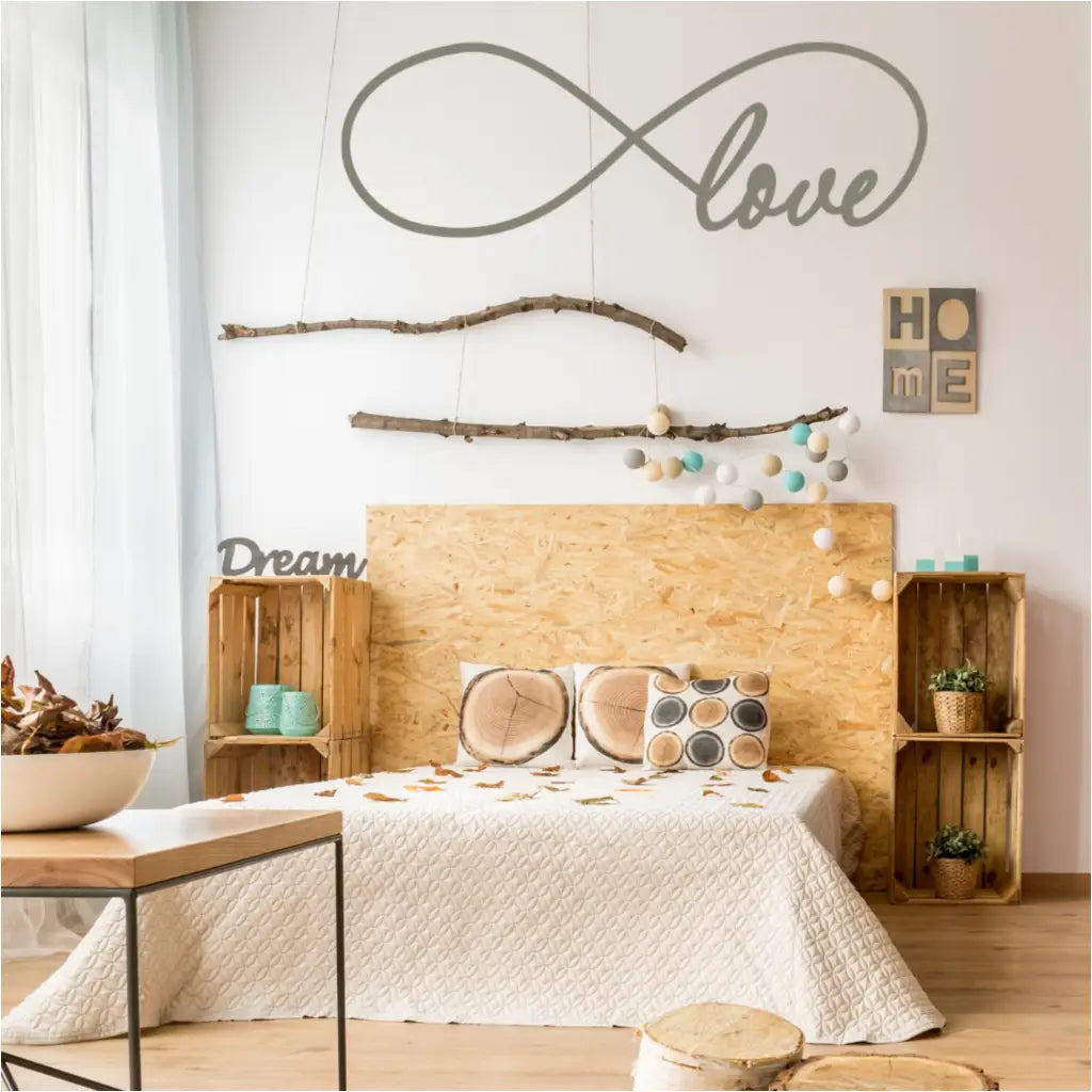A large infinity wall decal that incorporates the word "love" into it's design to adorn walls of master bedroom.