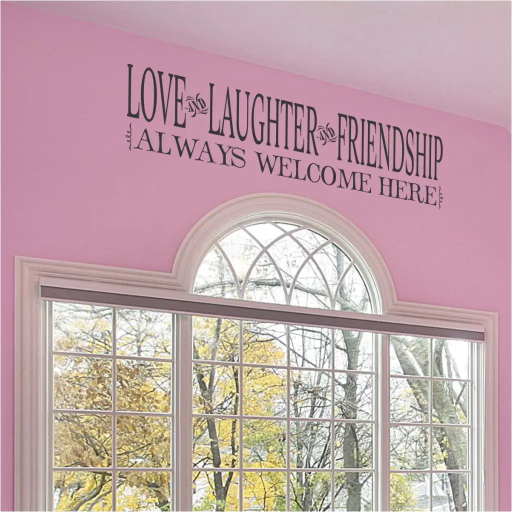 Love and laughter and friendship always welcome here. A beautiful wall decal by The Simple Stencil to display in an entryway or family room. 