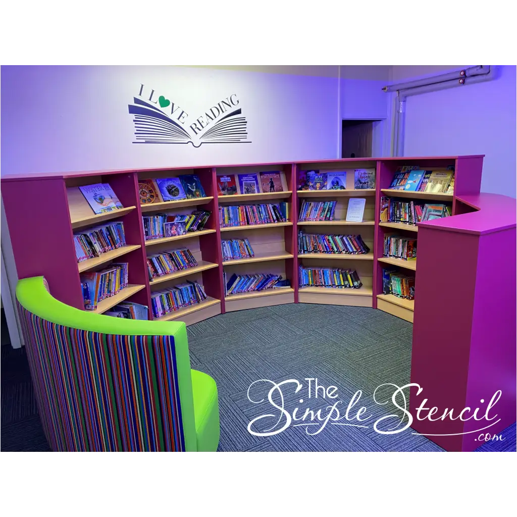 Customer submitted picture of this I Love Reading wall decal displayed in a larger size on a library wall - Submitted by Church of England Primary School using TheSimpleStencil.com  library wall art.