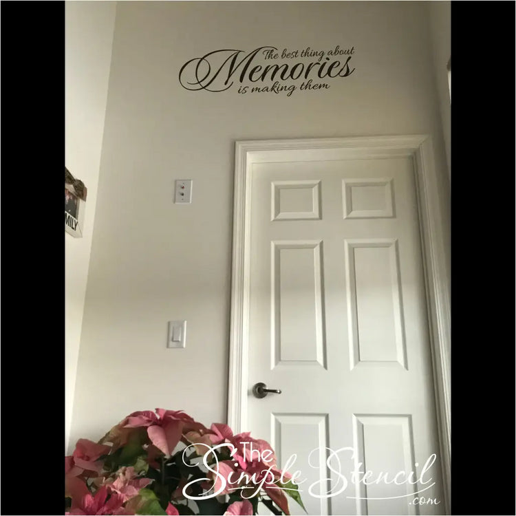 The best thing about memories is making them wall quote decal by The Simple Stencil installed on a hallway wall above a door.