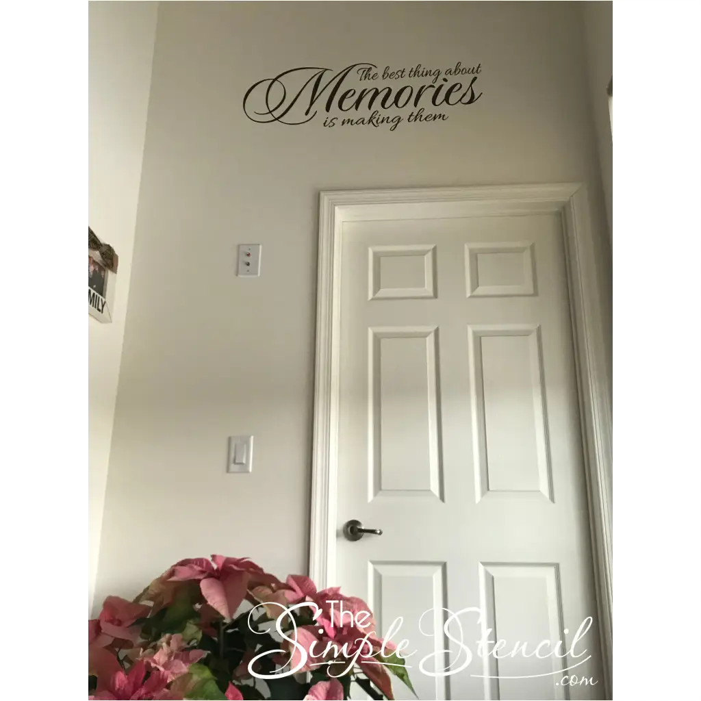 The best thing about memories is making them wall quote decal by The Simple Stencil installed on a hallway wall above a door.