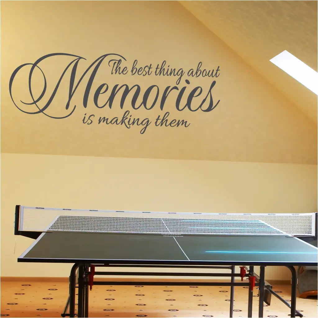 The best thing about memories is making them - large vinyl wall decal displayed in a family room game room over a ping pong table.