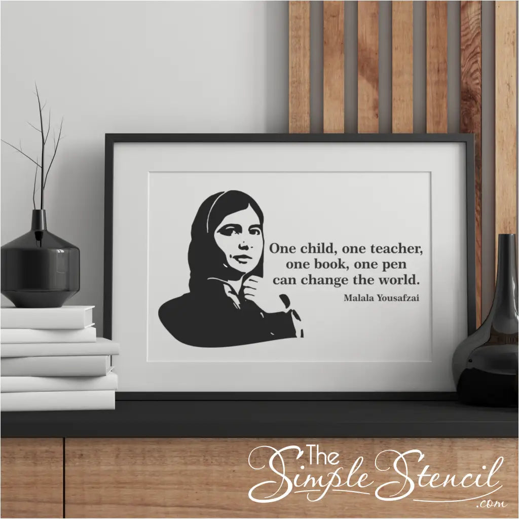 Framed Malala Yousafzai poster print in an office: A framed Malala Yousafzai poster print hanging in a modern office, promoting a culture of equality.