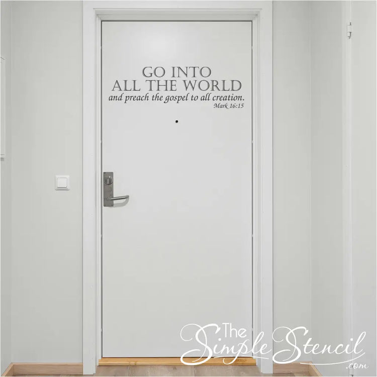 The inspiring words of Mark 16:15 displayed as a wall decal near the exit of a church building, a final call to action as believers go out into their communities.