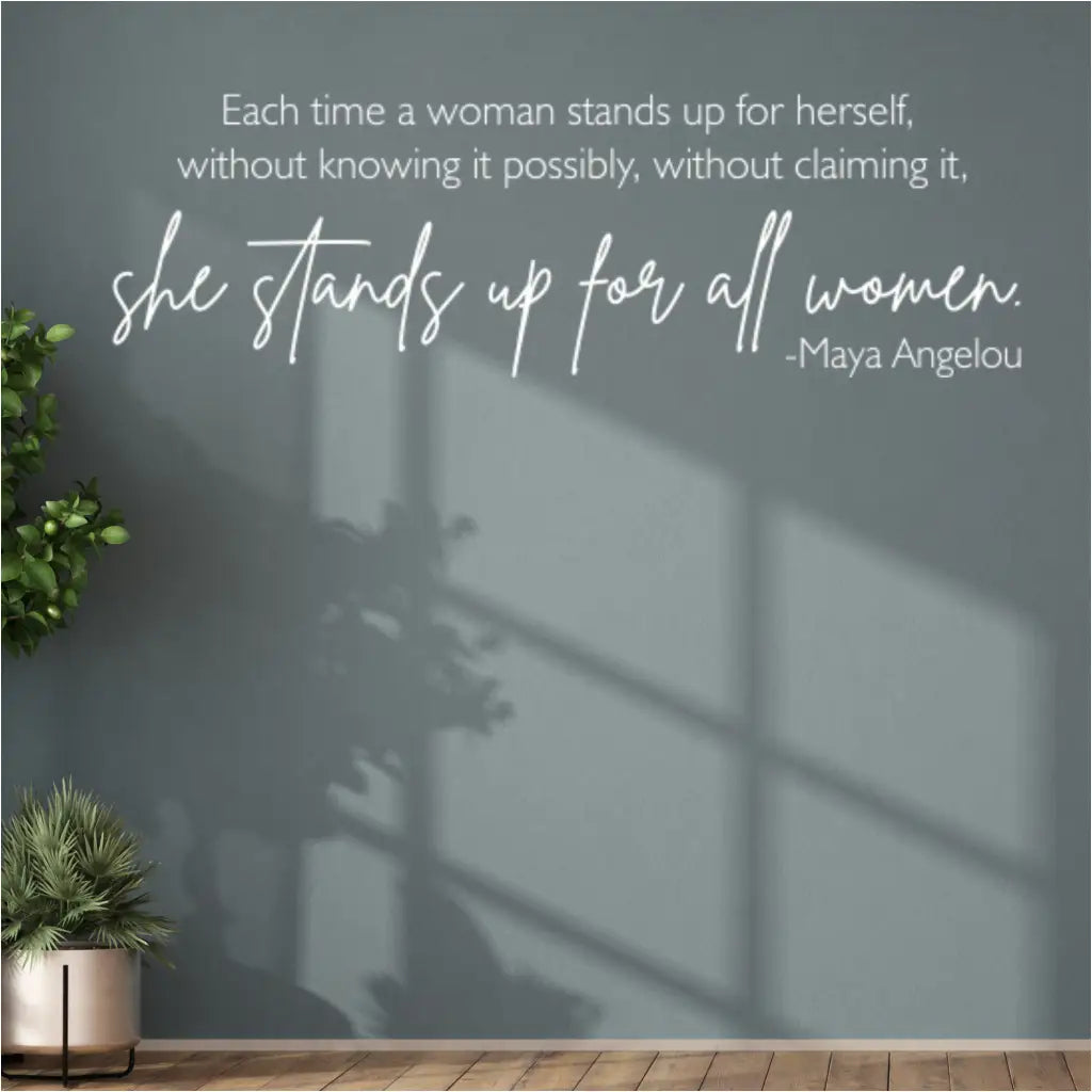 Inspiring wall decal with Maya Angelou's quote on women's empowerment. Each time a woman stands up for herself, she stands up for all women"