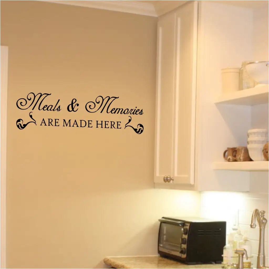 A popular wall decal by The Simple Stencil for the kitchen or pantry displayed on a kitchen wall reads: Meals and memories are made here.