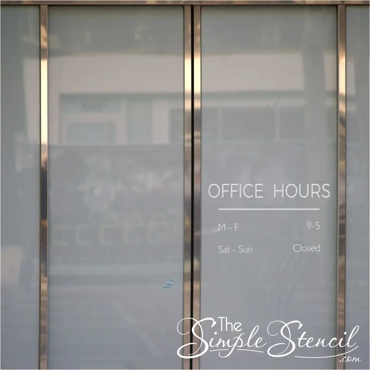 Minimalist "OFFICE HOURS" decal in white on a glass door with clean, sans-serif font.