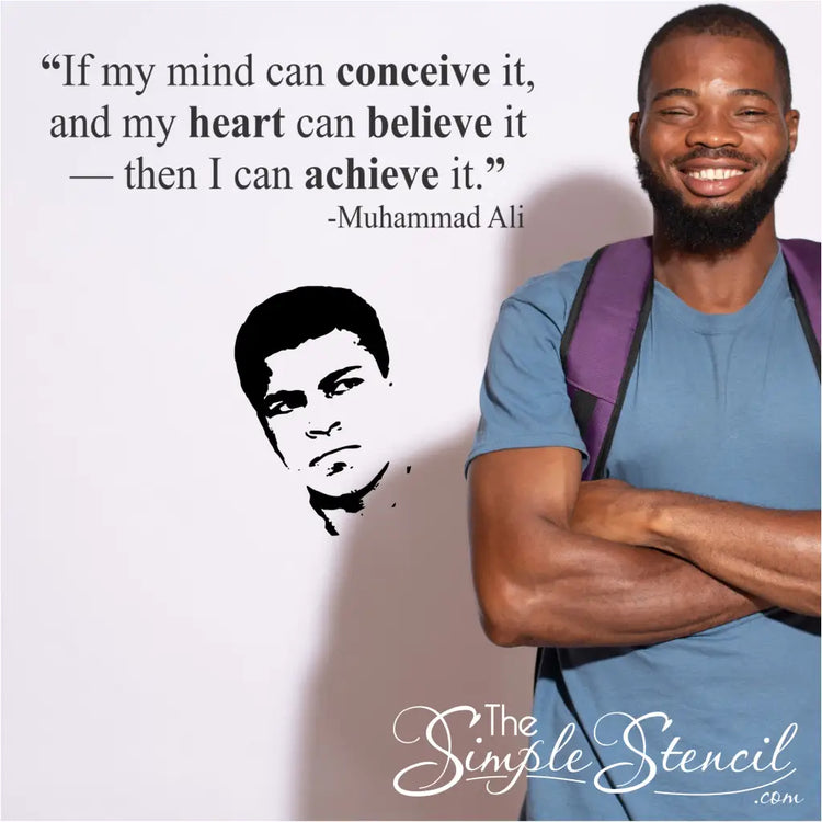Muhammed Ali Wall Quote and Head Silhouette Decal by The Simple Stencil installed on a school wall next to an inspired student.
