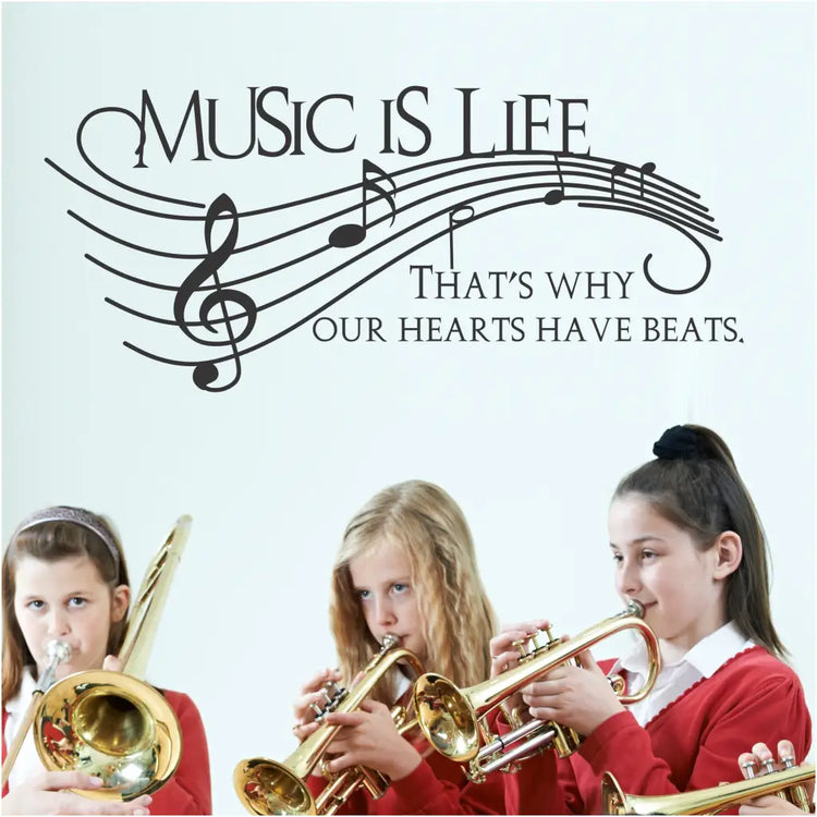 Music is life, that's why our hearts have beats. A large vinyl wall decal for display in a music room, band room, etc. 