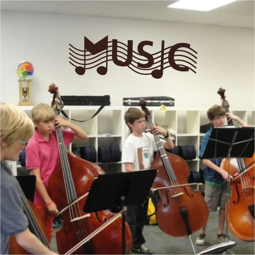 Large MUSIC vinyl wall decal applied to a school band room practice area can dress up a boring wall.