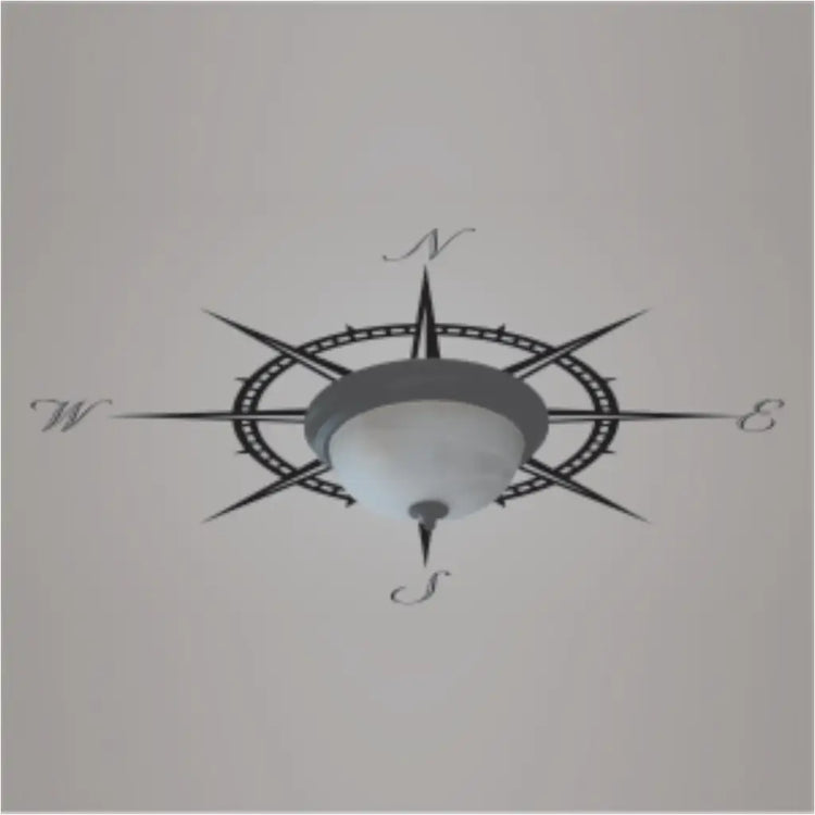 Large nautical compass ceiling decal by The Simple Stencil fits behind a light fixture or ceiling fan and adds an instant nautical vibe to any room!