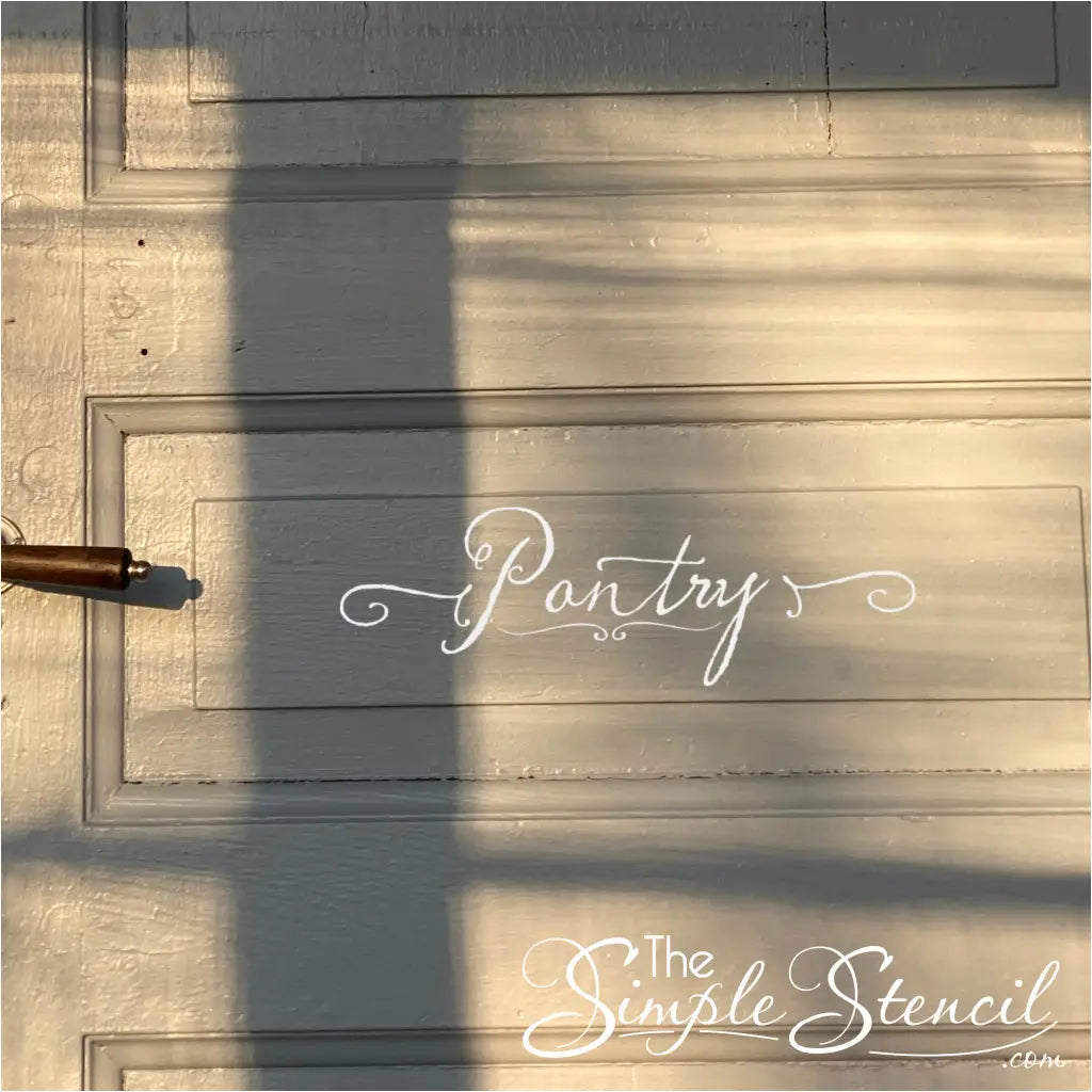 Small rustic style farmhouse decor designates the pantry by placing on an old wooden door makes finding snacks a cinch!