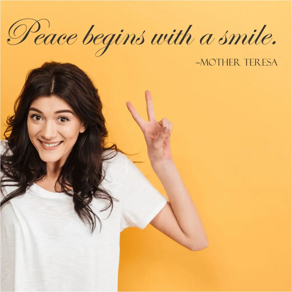 Peace begins with a smile. Mother Teresa | A vinyl wall quote decal displayed on a teachers wall to inspire her students.