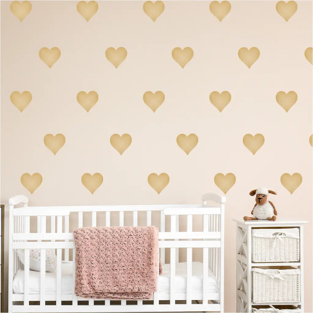 Easy Peel and Stick Heart Decals Displayed on  a Baby Nursery Wall by The Simple Stencil creates a nice focal point behind babies crib.