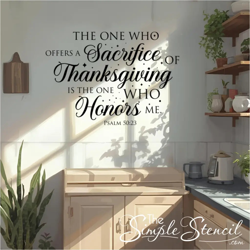 The Psalm 50:23 scripture wall decal is applied to a bright, sunlit kitchen wall above a wooden bread box, showing its use as kitchen decor.