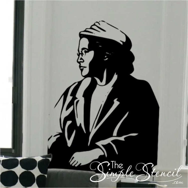 Rosa Parks Silhouette Wall Decal Sticker featuring Rosa Parks looking out the window wearing a hat.