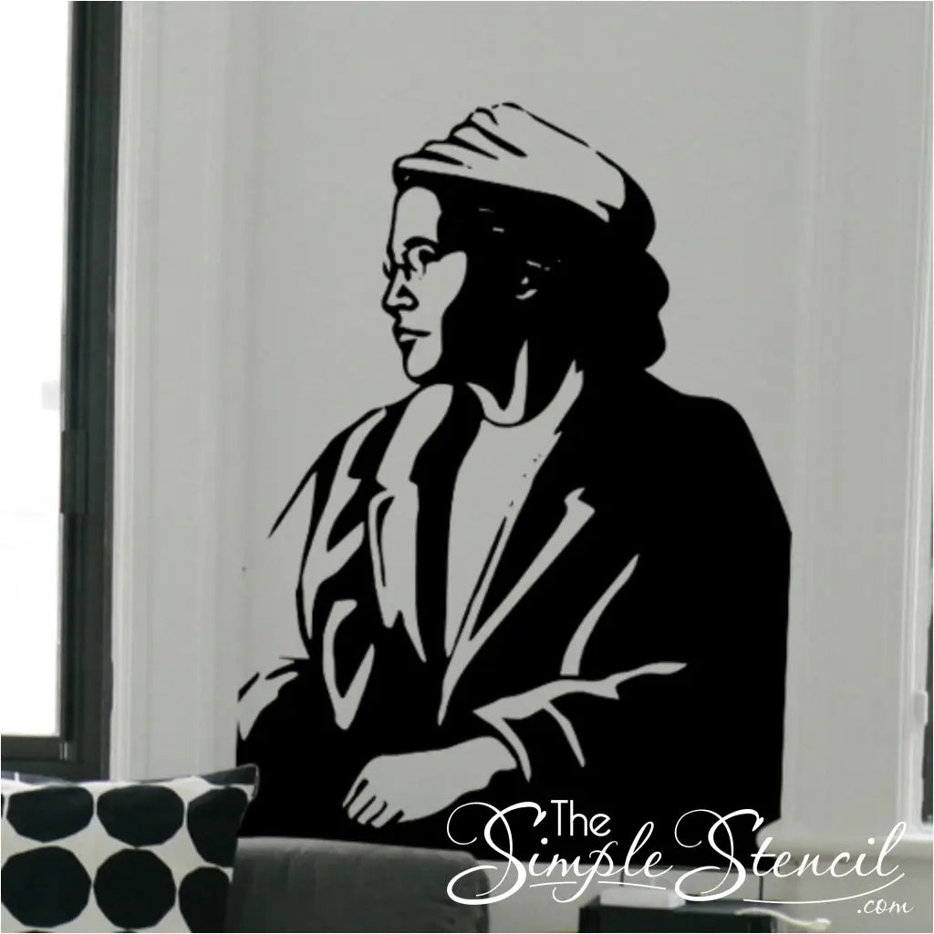 Rosa Parks Silhouette Wall Decal Sticker featuring Rosa Parks looking out the window wearing a hat.